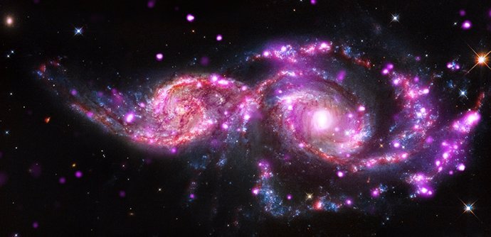 Telescopios espaciales captan impresionantes galaxias espirales superpuestas Telescopios espaciales captan impresionantes galaxias espirales superpuestas
