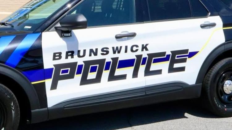 Hombre arrestado por asesinato nocturno en el centro de Brunswick